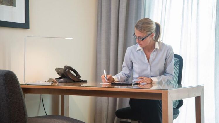 woman studying on desk business room