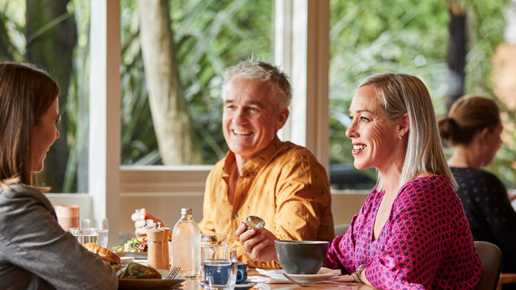 three dining in restaurant