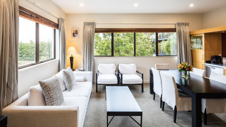 Example of Family accommodation in Christchurch, this large hotel room has a double bed and two singles.